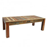 a wooden bench sitting on top of a white table